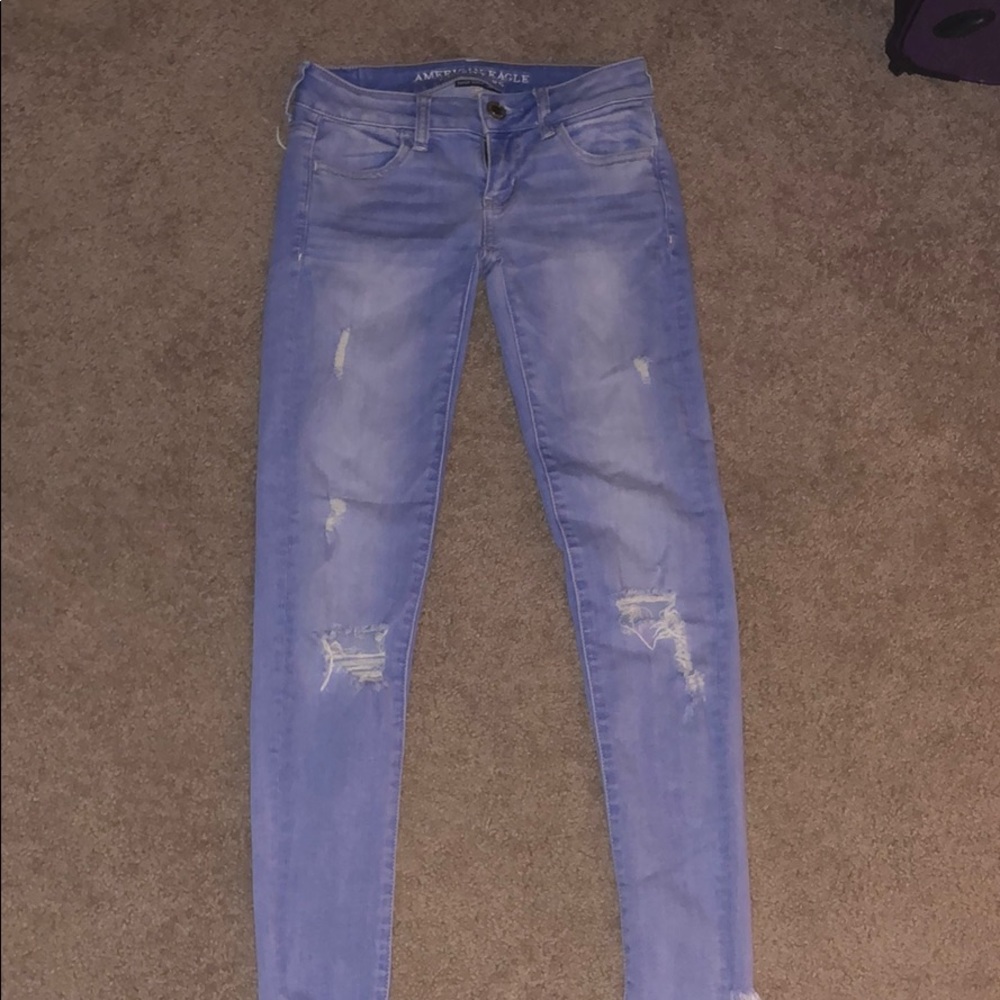 Ripped blue skinny jeans